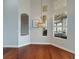 Bright dining area with hardwood floors and a stylish light fixture at 2622 Bonterra Blvd, Valrico, FL 33594