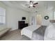 Spacious main bedroom with ceiling fan and large windows at 2622 Bonterra Blvd, Valrico, FL 33594
