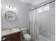 Updated bathroom with tub, toilet, and vanity with mirror at 2622 Bonterra Blvd, Valrico, FL 33594