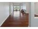 Hardwood floor living room with view of patio and pool at 2622 Bonterra Blvd, Valrico, FL 33594