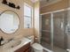 Updated bathroom with a walk-in shower and vanity at 2622 Bonterra Blvd, Valrico, FL 33594