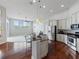 Modern kitchen with stainless steel appliances and an island with seating at 2622 Bonterra Blvd, Valrico, FL 33594