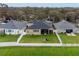 Aerial view showcasing house and surrounding neighborhood at 2622 Bonterra Blvd, Valrico, FL 33594
