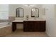 Bathroom features a double vanity and large mirrors at 2622 Bonterra Blvd, Valrico, FL 33594