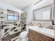 Updated bathroom with walk-in shower and modern vanity at 2920 Star Apple Ct, Palm Harbor, FL 34684