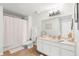 Spacious bathroom featuring a large mirror, ample countertop space, and white cabinets at 345 Bayshore Blvd # 1104, Tampa, FL 33606