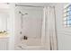 Bright bathroom with tub and shower combination and vanity with white cabinets and countertop at 345 Bayshore Blvd # 1104, Tampa, FL 33606