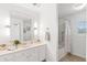 Bathroom with white cabinets, large vanity, tub, and shower at 345 Bayshore Blvd # 1104, Tampa, FL 33606