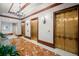 Lobby with three elevators and seating area at 345 Bayshore Blvd # 1104, Tampa, FL 33606