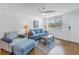 Living room with light blue couch and wood floor at 4715 Bay Ne St # 227, St Petersburg, FL 33703