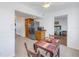 Kitchen dining area with table and chairs, view into bedroom at 4715 Bay Ne St # 227, St Petersburg, FL 33703