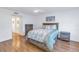 Bedroom with wood floors and built-in shelving at 4715 Bay Ne St # 227, St Petersburg, FL 33703