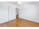 Bedroom with wood floors and access to another room at 4715 Bay Ne St # 227, St Petersburg, FL 33703