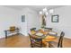 Dining room with round wooden table and four chairs at 4715 Bay Ne St # 227, St Petersburg, FL 33703