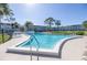 Relaxing kidney-shaped swimming pool with surrounding patio at 4715 Bay Ne St # 227, St Petersburg, FL 33703
