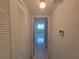 Long hallway with access to bedrooms and living spaces at 4915 Bay Ne St # 122, St Petersburg, FL 33703