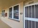 Condo entrance with security door and windows at 4915 Bay Ne St # 122, St Petersburg, FL 33703