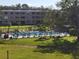Refreshing community pool with lounge chairs at 4915 Bay Ne St # 122, St Petersburg, FL 33703