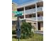 Exterior view of building with parking and signage at 4915 Bay Ne St # 122, St Petersburg, FL 33703