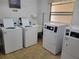 Well-lit laundry room with multiple washers and dryers at 4915 Bay Ne St # 122, St Petersburg, FL 33703