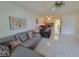 Living room with sectional sofa and tiled floors at 4915 Bay Ne St # 122, St Petersburg, FL 33703