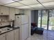 Kitchen with access to a relaxing patio area at 4915 Bay Ne St # 122, St Petersburg, FL 33703