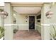 House entrance with a black door and brick walkway at 6200 Bahama Shores S Dr, St Petersburg, FL 33705