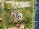 Aerial view showcasing a home with a pool and large lot at 6200 Bahama Shores S Dr, St Petersburg, FL 33705