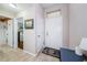 Bright entryway with tile flooring, leading to bedroom and bathroom at 804 Staffordshire Ln # 15, Sun City Center, FL 33573