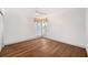 Bright bedroom with wood floors, white walls, and a sunny window at 910 Oakwood Dr, Largo, FL 33770