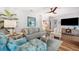 Cozy living room featuring a neutral color scheme and decorative accessories at 910 Oakwood Dr, Largo, FL 33770