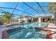 Screened-in pool with hot tub at 910 Oakwood Dr, Largo, FL 33770