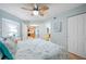 Bedroom with king bed, access to kitchen and bathroom at 1310 Gulf Blvd # 11B, Clearwater Beach, FL 33767