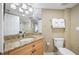 Bathroom with granite vanity and walk-in shower at 1310 Gulf Blvd # 11B, Clearwater Beach, FL 33767