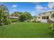 Spacious backyard with lush lawn, providing ample outdoor space at 1015 Snell Isle Ne Blvd, St Petersburg, FL 33704