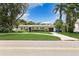 House exterior, ranch style home with driveway and lawn at 1015 Snell Isle Ne Blvd, St Petersburg, FL 33704