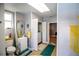 Bathroom with a white vanity and laundry closet at 130 63Rd S St, St Petersburg, FL 33707