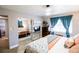 Main bedroom with a king-size bed and coastal decor at 130 63Rd S St, St Petersburg, FL 33707