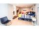 Guest bedroom with two twin beds and nautical decor at 130 63Rd S St, St Petersburg, FL 33707