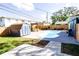 Inviting backyard oasis with a pool, pergola, and shed at 130 63Rd S St, St Petersburg, FL 33707