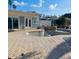 Relax in the large pool and spa with ample patio space at 17082 Dolphin Dr, North Redington Beach, FL 33708