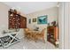 Cozy breakfast nook featuring a round table and wicker chairs at 1827 Pine Cone Cir, Clearwater, FL 33760