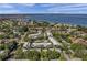 Aerial view of community near waterfront at 1827 Pine Cone Cir, Clearwater, FL 33760
