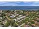 Aerial view of community near the waterfront at 1827 Pine Cone Cir, Clearwater, FL 33760
