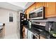 Well-equipped kitchen with stainless steel appliances at 1827 Pine Cone Cir, Clearwater, FL 33760