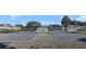 Community tennis courts with ample space for play at 1827 Pine Cone Cir, Clearwater, FL 33760