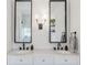 Double vanity bathroom with modern lighting and mirrors at 206 W Frierson Ave, Tampa, FL 33603