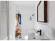 Bright bathroom featuring a colorful shower curtain and modern fixtures at 206 W Frierson Ave, Tampa, FL 33603