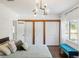 Bright bedroom with spacious closet and a window seat at 206 W Frierson Ave, Tampa, FL 33603