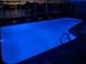 Pool with blue lighting, creating a relaxing ambiance at 212 Poinciana Ln, Largo, FL 33770